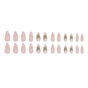 Almond-shaped press-on nails with French floral and butterfly patterns on nude base