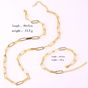 Gold paperclip link necklace and bracelet set with specific length and weight details