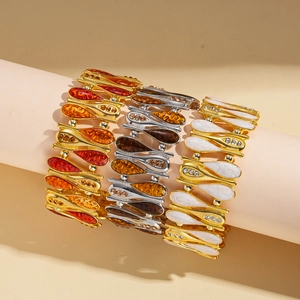 Bracciali vintage in smalto con zirconi in tonalità arancio, marrone e oro bianco
