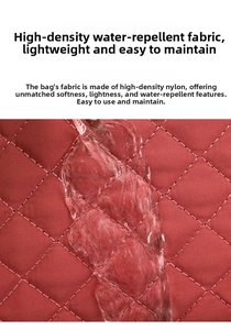 Detail of red quilted nylon fabric showing its high-density water-repellent surface