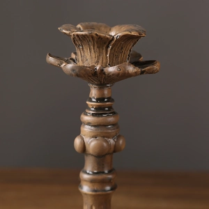 Vintage bronze resin candle holder with ornate floral top for romantic dinner decor