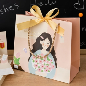 Pink Thank You Teacher gift bag with ribbon bow and floral illustration for educators