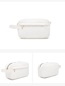 Three-angle views of a white corduroy makeup bag with a gold zipper and side handle