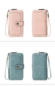 Detail of RFID long zipper wallets in pink and green with hollow lines and metal buckle