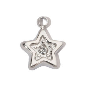 Macro detail of star-shaped stainless steel pendant with sparkling cubic zirconia stone