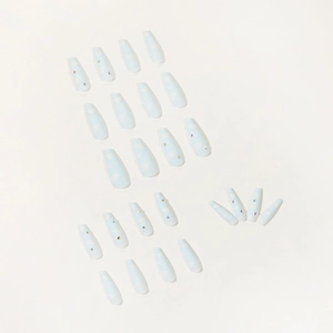 Cloud pattern press on nails with light blue base and colorful rhinestones in long ballet shape