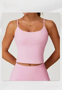 Detail of pink brushed yoga vest showing hollow back and double shoulder straps on model