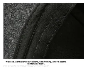 Macro shot of thick sweatband and fine double-needle stitching on men wool baseball cap
