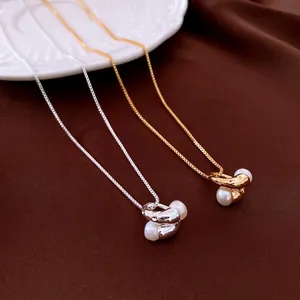 Minimalist 18k gold plated irregular metal knot necklace with two white round pearls