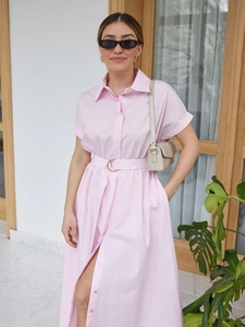 Detail of light pink shirt dress with gold buckle belt and front buttons