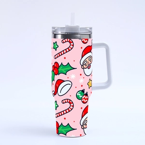40oz stainless steel Christmas tumbler with Santa and candy cane prints, straw and handle