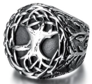 Close-up of vintage Viking Tree of Life ring with intricate woven edges and silver finish