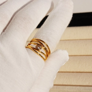 French vintage irregular layered gold ring with multi-layer lines and a sparkling zircon