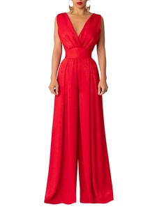 Detail of red deep V-neck sleeveless jumpsuit with wide legs and cinched high waist