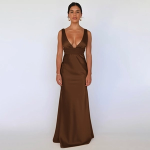 Detail of the deep V-neck and backless design on this brown satin maxi evening dress