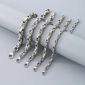Detail of five assorted widths of stainless steel Byzantine chains with lobster clasps