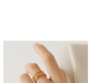 Detail of multi-layered 18k gold plated ring with micro-pave white zircon setting