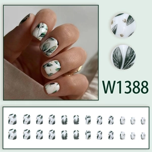 Short vintage green leaf false nails set with gold foil accents and 24 individual pieces