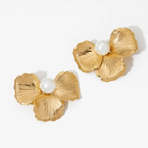 Elegant gold flower earrings with white pearl center on a clean white background