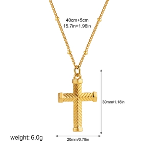 Golden stainless steel cross pendant necklace with twist texture on a clean white background