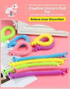 Close-up of colorful unicorn stretchy sensory bracelets with soft textured spikes for kids