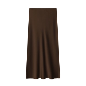 Detail of dark brown satin midi skirt showing smooth texture and elegant drape