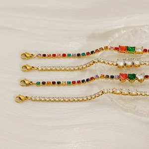 Golden 3mm tennis bracelets with colorful zirconia stones in various elegant cuts