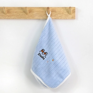 Detail of light blue microfiber hanging towel with cute cartoon duck embroidery
