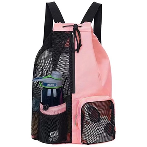 Pink and black mesh drawstring bag detail featuring front pockets and side water bottle holder