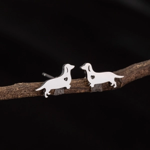 Silver dachshund dog stud earrings in stainless steel with heart cutout detail