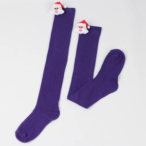 Detail of dark purple Christmas over-knee socks featuring 3D Santa Claus plush ornaments