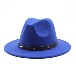 Detail of royal blue fedora hat with black leather band and silver star rivets