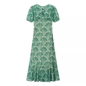 Green floral chiffon midi dress with shell print and puff sleeves on white background