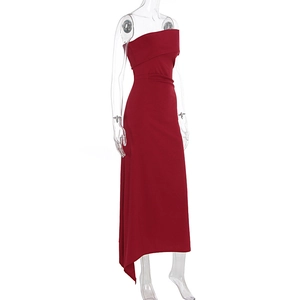 Detailed view of dark red asymmetrical evening dress with elegant waist tailoring