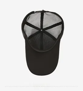 Interior detail of black mesh baseball cap showing inner lining and stitching quality