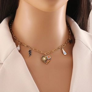 Gold stainless steel necklace with daisy heart, lightning bolt, and pearl charms