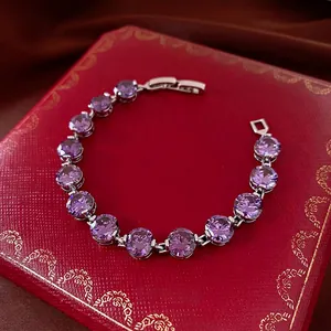 Fashionable luxury zircon round clasp bracelet featuring purple crystals on a red box