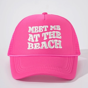 Hot pink trucker hat with MEET ME AT THE BEACH embroidery and breathable mesh back