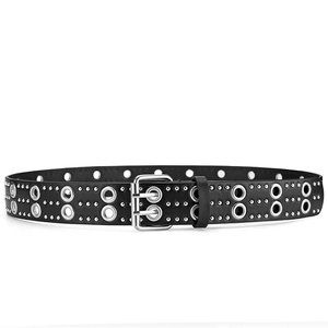 Detail of black leather punk belt with double pin buckle and silver rivet studs
