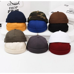 Detailed grid of cotton miki hats in eleven assorted colors including navy and camel
