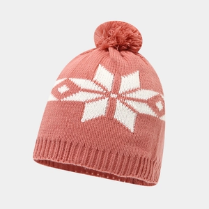 Detail of pink knitted beanie with white snowflake pattern and fluffy pom-pom top