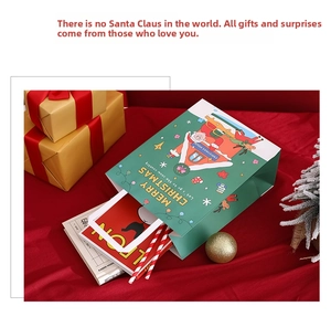 Christmas gift bag with Santa and reindeer patterns on a red festive background