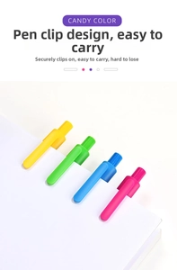 Close-up of vibrant candy color office pens with portable clip design on paper