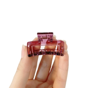 Translucent purple rectangular hair claw clip for women's summer hairstyles on white background
