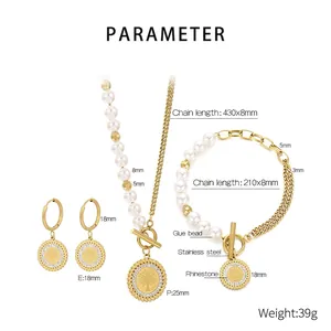 Detail of 18K gold-plated stainless steel Tree of Life jewelry set with pearls and crystals