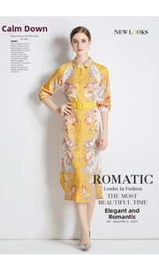 Detail of floral printed midi dress with turn-down collar and matching yellow buckled belt