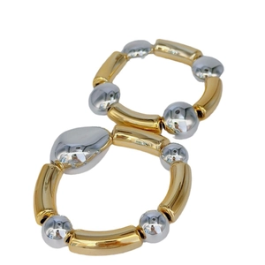 Minimalist gold and silver two-tone metallic bangle bracelet with sleek polished finish