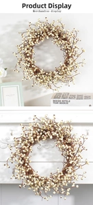 Close-up of white artificial berry wreath with natural twigs on a fireplace mantel