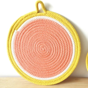 Nordic woven cotton rope placemat with citrus fruit design and hanging loop for wall decor