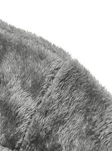 Detailed macro view of soft gray faux fur texture on men's winter fleece jacket